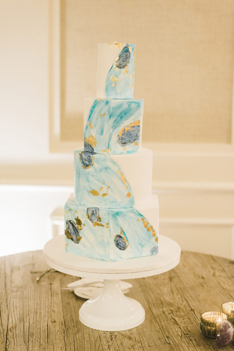 The wedding cake was inspired by geodes and Monet's paintings