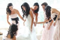 13 ruffled strapless bridesmaids’ dresses with black sashes for a refined look