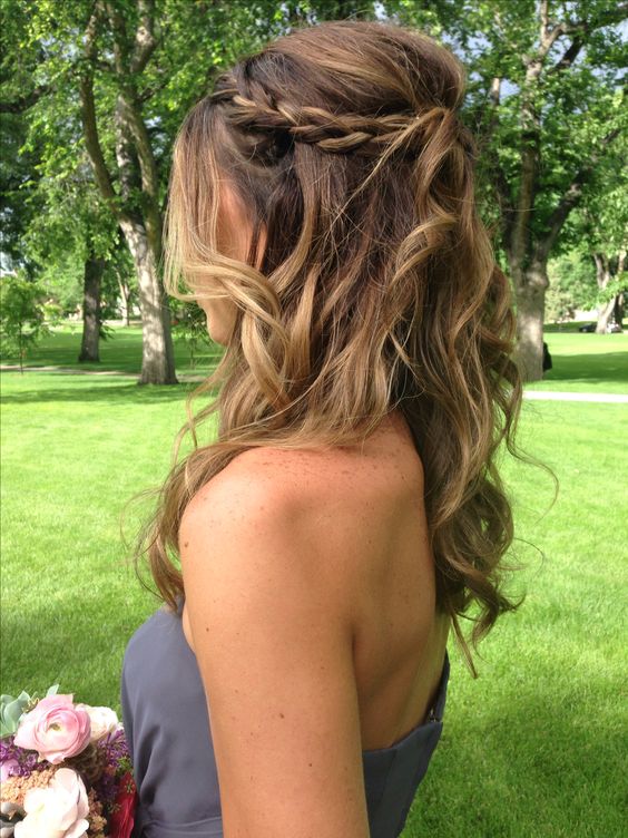wavy half updo with a braid and volume and with ombre coloring for a more interesting look
