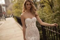 14 strapless mermaid wedding dress with lace appliques and embellishments for a sexy look by Berta
