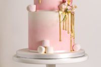 16 an ombre pink wedding cake with marshmallows, gold drip and macarons for a cute glam wedding