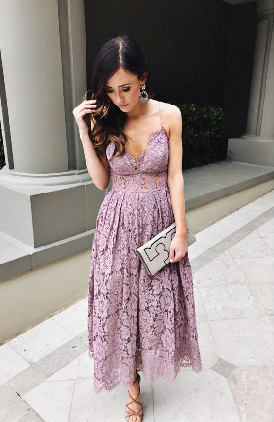 a dusty pink floral lace dress on spaghetti strap with chic detailing, strappy shoes and statement earrings