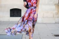 19 a bold abstract print sleeveless midi dress, pink strappy heels and a black cltuch