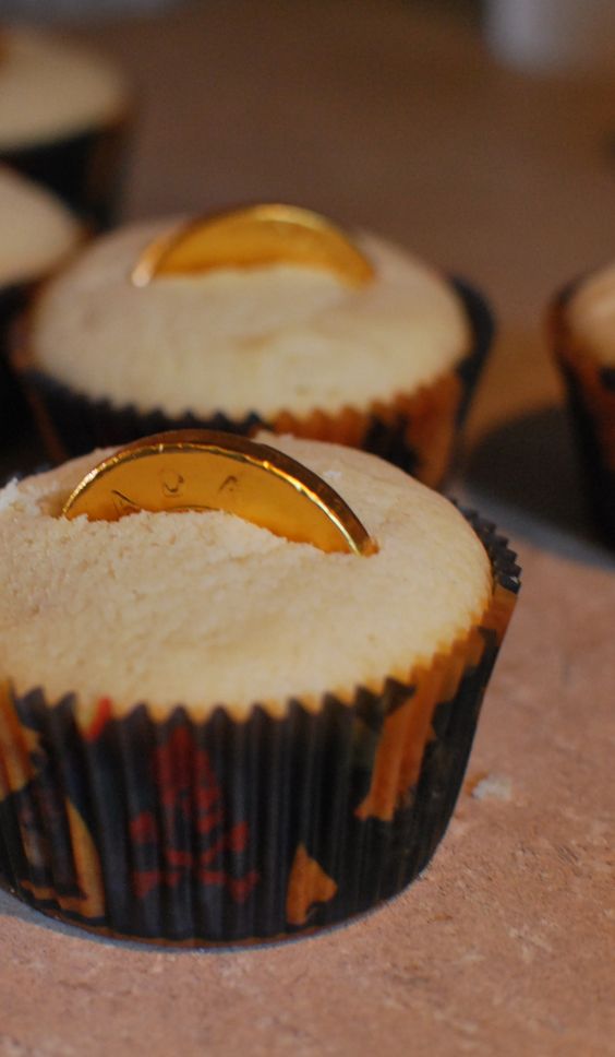 cupcakes with gold coin (edible, of course) are a nice idea for a pirate wedding