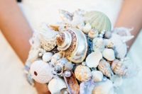 21 a bridal bouquet made of shells, sea urchins and pearls completely, no blooms