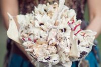 22 a shell bridal bouquet with corals is a unique statement