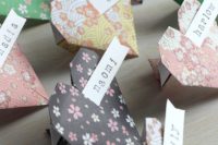 22 colorful origami heart place cards will be a fun addition to any space