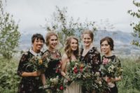 22 mismatching dark floral bridesmaids’ dresses of various lengths and looks