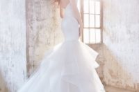 24 a mermaid strap wedding dress with a layered tail and an open back by Hayley Paige