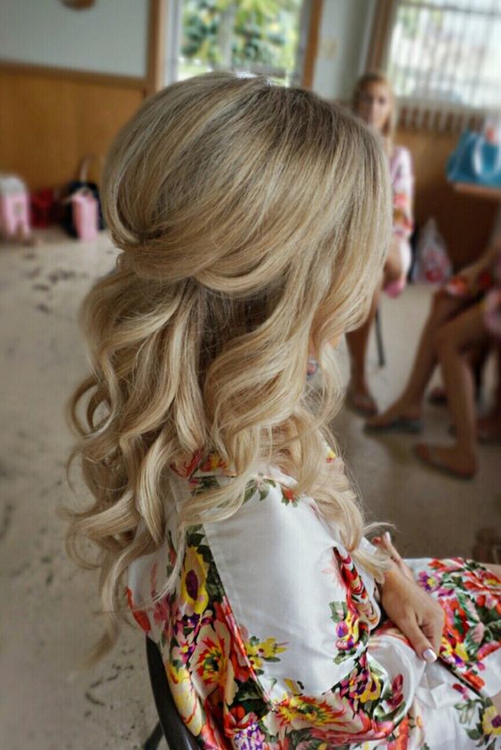 a pretty half up hairstyle with curls and volume on op is a chic idea for any girl