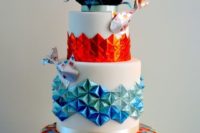 25 a colorful wedding cake decorated with origami and koi fish for a quirky Japanese wedding