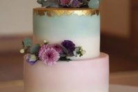 26 an ombre pastel wedding cake with a gold leaf top and fresh blooms for a quirky summer wedding