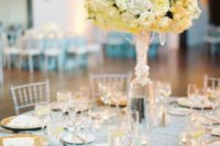 27 textural tablecloths, yellow blooms and chargers for an elegant formal wedding