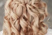 a braided half updo with curls looks cute, girlish and very glam, it will fit most of styles