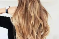 a braided half updo with light waves on long hair is a great idea for many styles