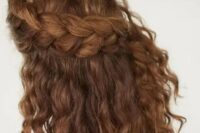 a half updo with a large side braided halo and locks down will easily accent your folksy or boho look