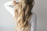 a lovely half updo with a twisted touch, a bump on top and waves down is a cool idea for a boho look