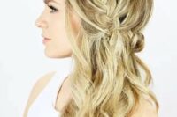 a side braided half updo with waves is a trendy idea with a twist to a usual braid