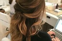 a twisted wavy half updo is a chic idea to try and is great for both long and medium-length hair