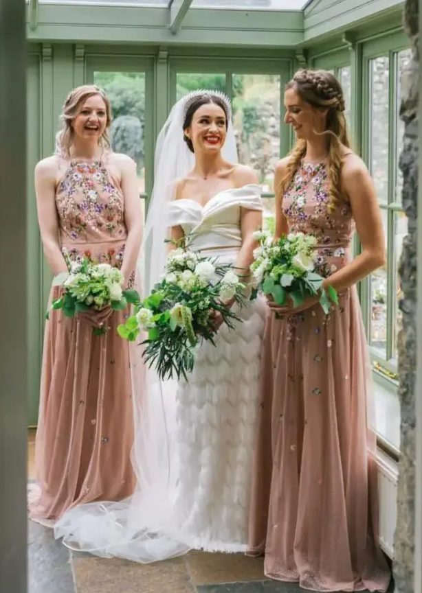 blush maxi dresses with halter necklines and with floral embroidery look really catchy