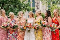 bold floral maxi and midi bridesmaid dresses with mismatching designs and necklines are gorgeous for a vintage wedding