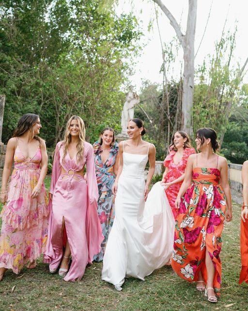 bright and colorful maxi plain and floral pink bridesmaid dresses for a color-filled summer wedding