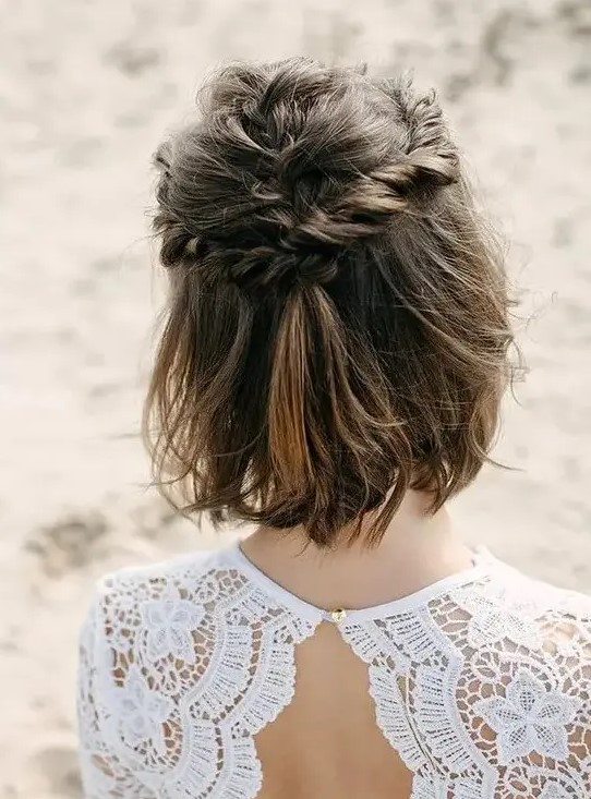 hair down with twisted and a usual braid on top plus some textural wavy hair is a super cool idea for a bride or bridesmaid