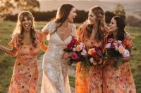 matching orange floral semi-fitting bridesmaid dresses with ruffle sleeves for a cheerful summer wedding