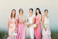 mismatching bright pink and floral maxi bridesmaid dresses with various detailing are cool and catchy