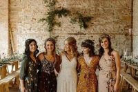 mismatching maxi and knee bridesmaid dresses with floral prints are a great solution for a boho wedding