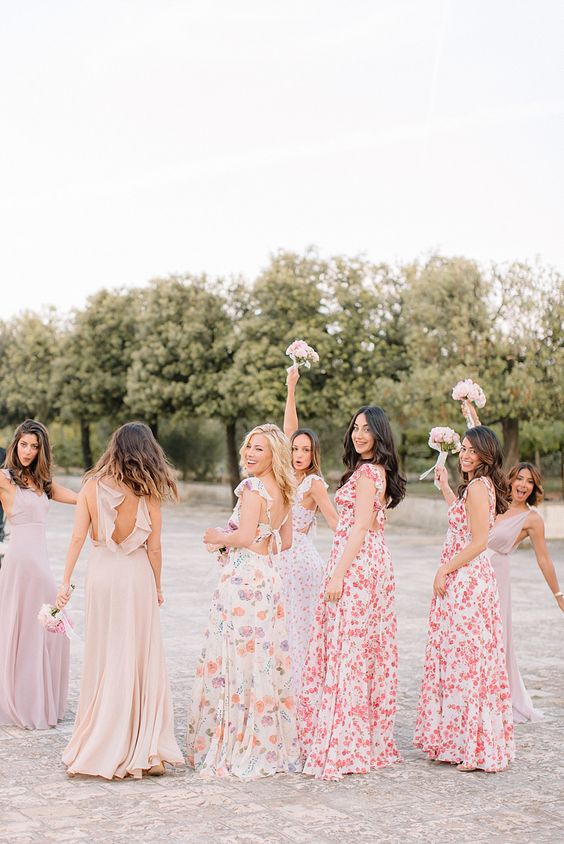 mix and match maxi floral and plain bridesmaid dresses for a spring or summer wedding, done in soft shades