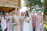 mix and match pink, blush and neutral floral bridesmaid dresses of maxi length for a summer wedding