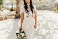 02 The bride was wearing a gorgeous lace two piece ensemble with a high neckline, short sleeves and a pencil skirt