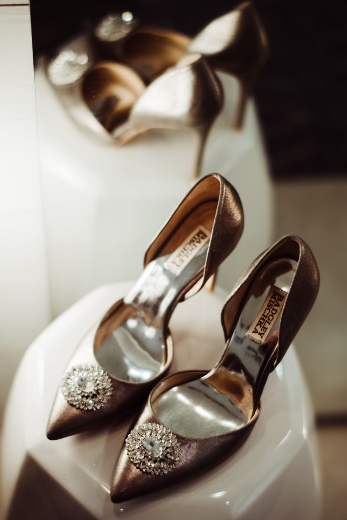The bride was wearing metallic wedding shoes with heavy embellishments
