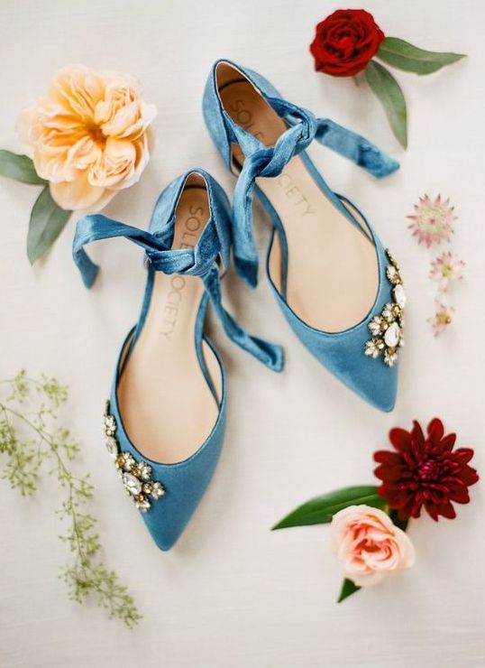 blue pointed flats with ties and embellishements for a bold and catchy look