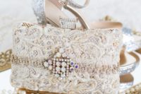 02 silver glitter shoes and a lace embellished wedding clutch with a lot of bling for a glam feel