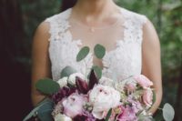 03 Her bouquet was done with light pink, blush and purple blooms and greenery that were also seen in the bouquet