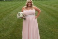 03 a light pink strapless maxi gown with a glitter sash and a statement necklace