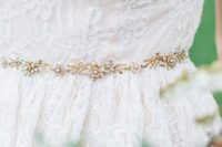 03 a very delicate gold and rhinestone bridal belt accents the dress and highlights your waist