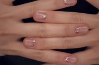 03 nude nails with rose gold glitter touches at the base of the nails