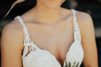 04 The bride was rocking a gorgeous strap lace wedding dress with an embellished plunging neckline