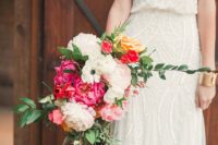 04 a gorgeous all-sparkling sheath wedding dress with a V-neckline and spaghetti straps