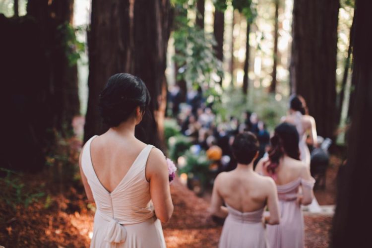 The bridesmaids were wearing mismatched blush dresses