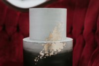 05 a brushed ombre black and white wedding cake with gold leaf decor for a bold wedding