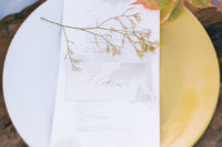 08 Slight watercolor wedding seating cards and a fall branch decorated the place setting