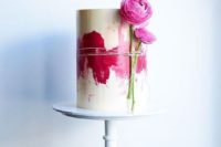 08 a modern watercolor wedding cake with hot pink decor and pink blooms attached