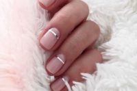 08 nude glossy nails with metallic stripes for a modern accent – a chic idea to make your nails catchy