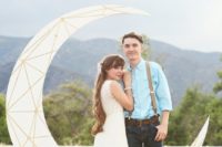 10 a geometric crescent moon wedding backdrop is a cute and romantic idea, just add some blooms