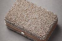 10 a gorgeous rhinestone and pearl box clutch is a super bold piece to make a stylish statement