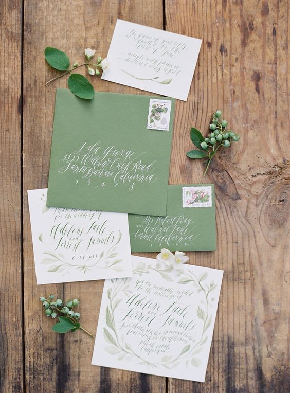 chic green and white wedding invitation suite with calligraphy and watercolro floral patterns